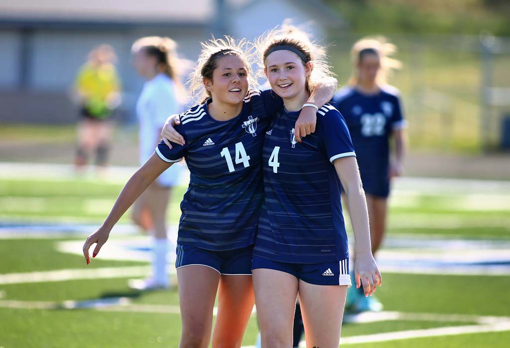 girls soccer team on the field
